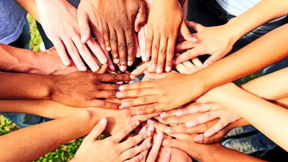 Substance Abuse Treatment Center in California - friends uniting with hands